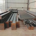 How is H-beam steel processed into steel structural members?
