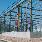 What specifications of steel are used in steel frame structures?